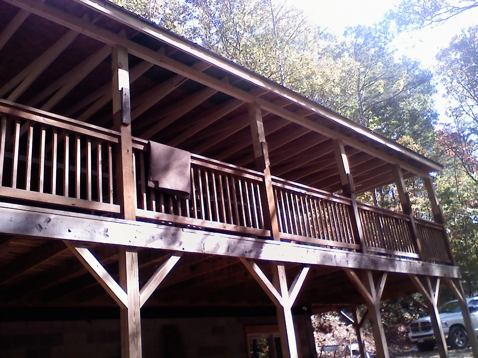 Timber framing under a new elevated porch and deck — Roof Leak Repair in East Wenatchee by Roofing Brothers